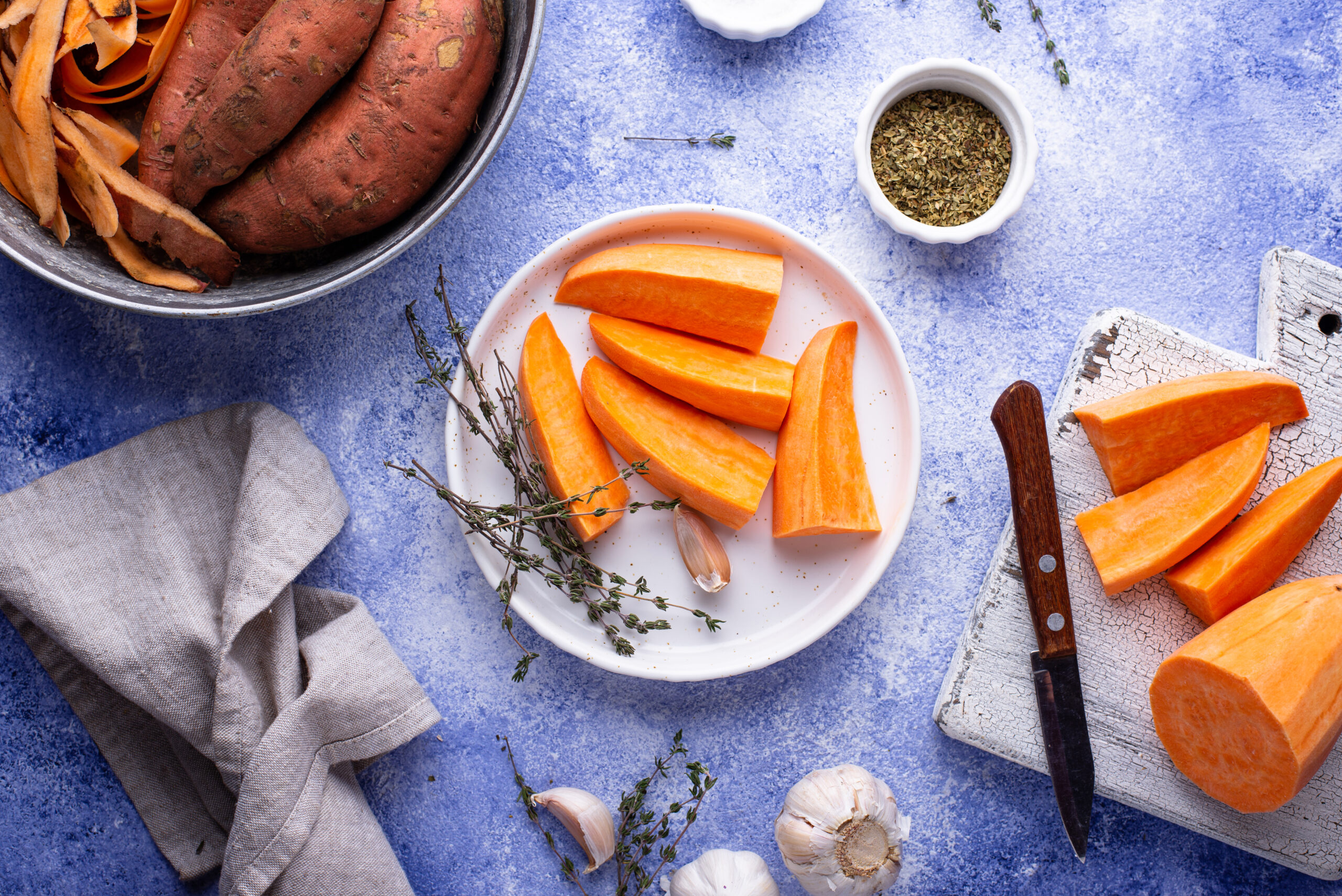 raw sweet potato with herbs and garlic 2022 01 18 23 43 52 utc scaled